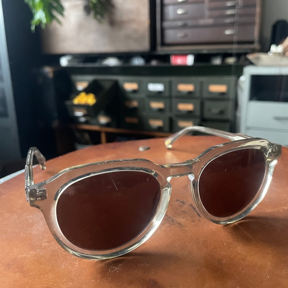 RAEN Clear Frame Sunglasses with brown polarized lenses. Very good condition.
